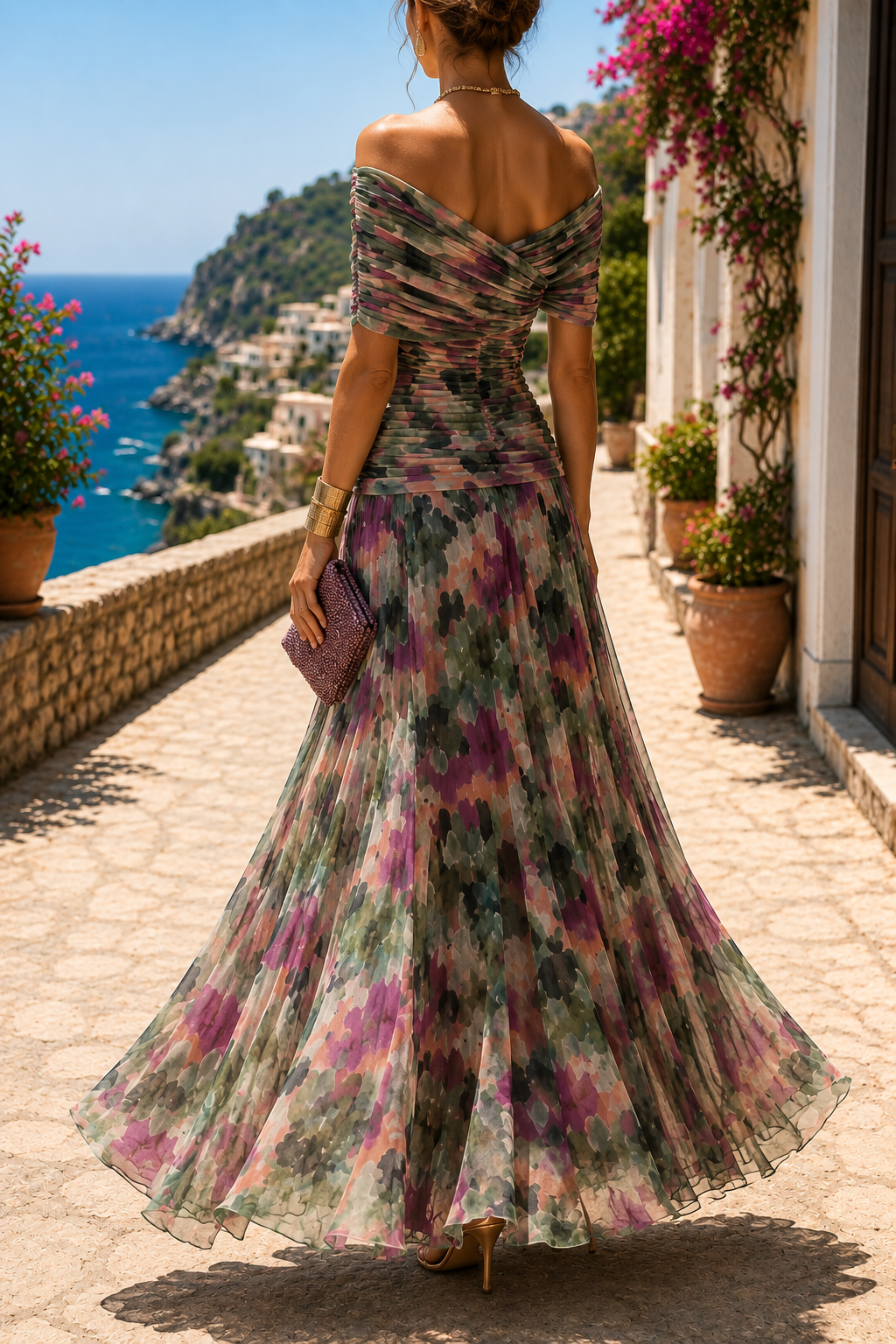 Vestido largo estampado floral con escote de hombros descubiertos.