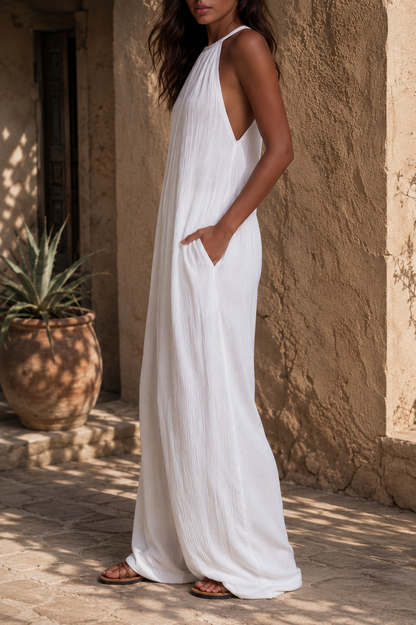 Elegante mono sin mangas con pantalón palazzo.